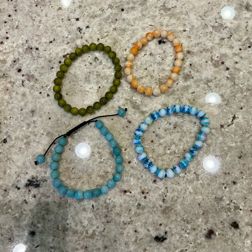 Set of Four Beaded Bracelets in Green, Orange, Blue, and Multicolor